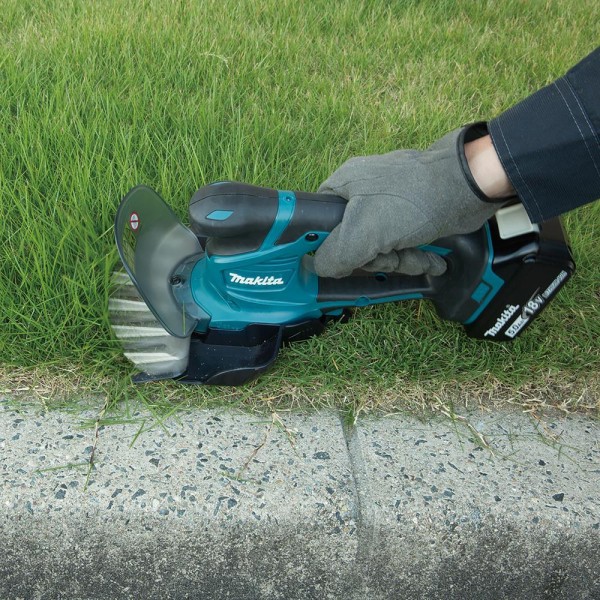 Makita Akku-Grasschere 18V DUM604SZ + Schwäble Schaumstoffeinlage + MAKPAC